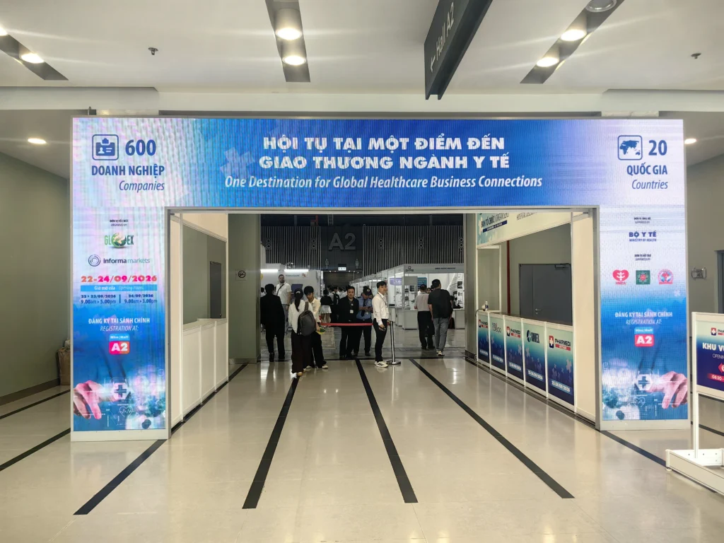 Entrance to PHARMEDI Vietnam 2026 at SECC, with event signage showing 22–24 September 2026