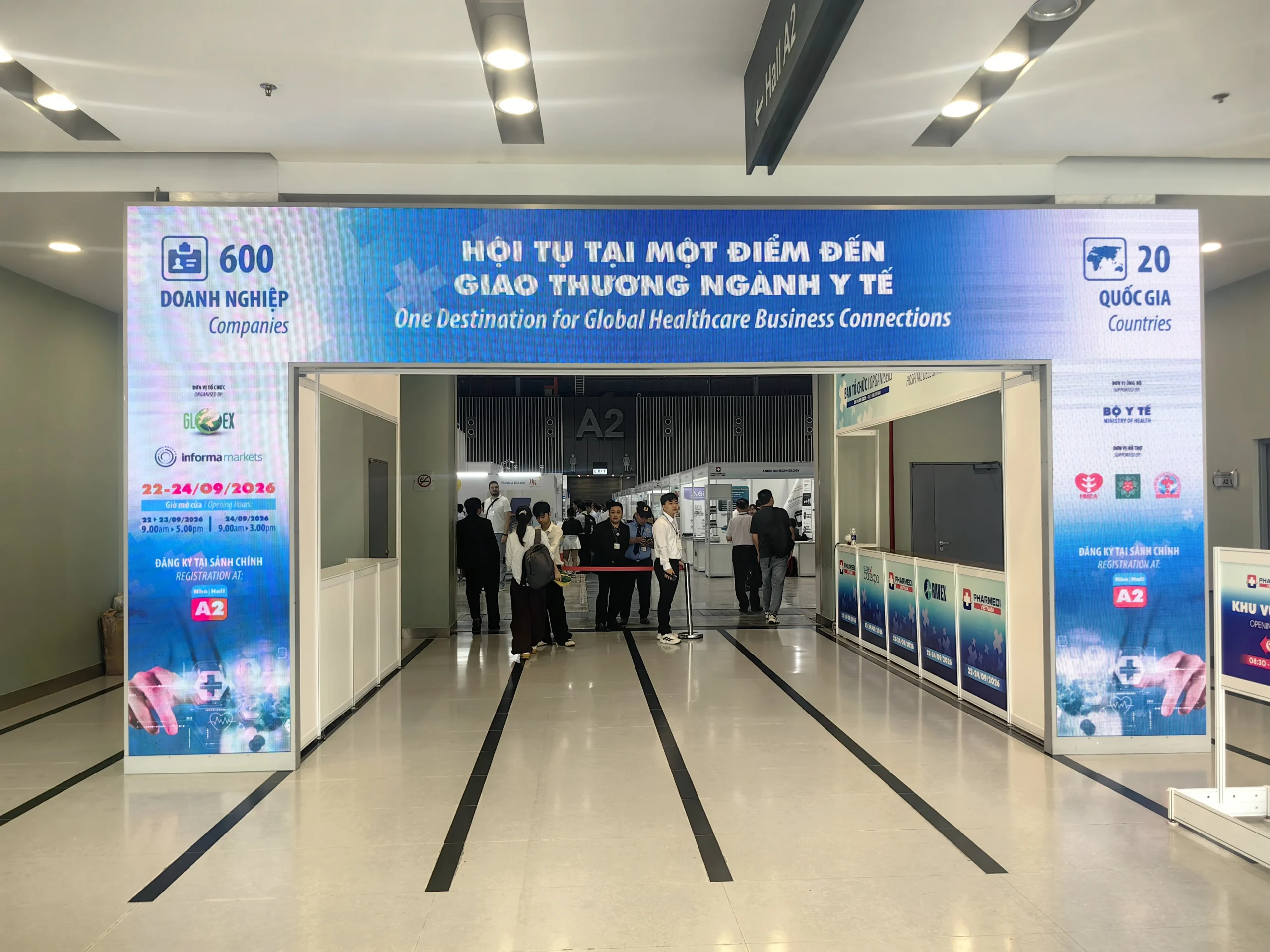 Entrance to PHARMEDI Vietnam 2026 at SECC, with event signage showing 22–24 September 2026